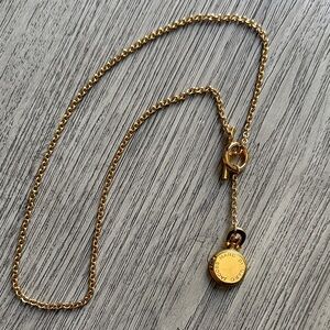 Marc Jacobs Elegant Gold Pendant Necklace